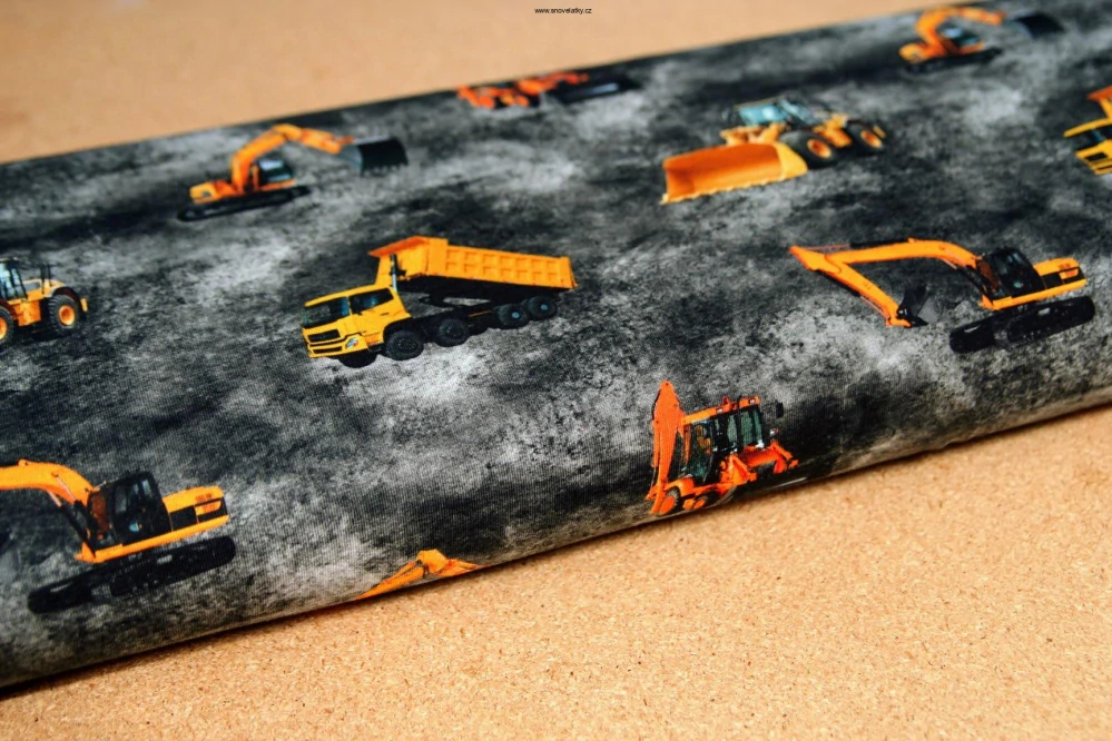 Úplet žlutý bagr a nákladní auto na šedém betonu