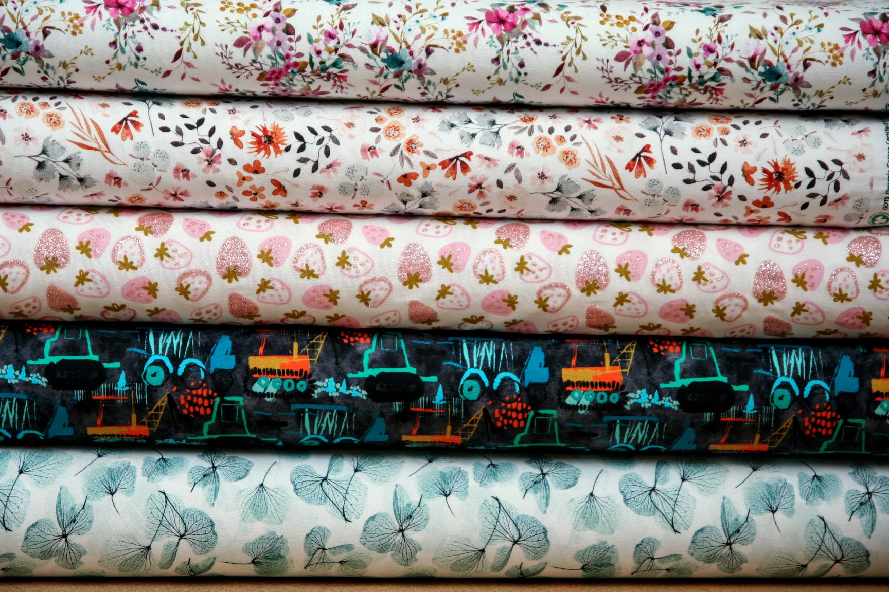 Teplákovina smaragdové lístečky na světlé