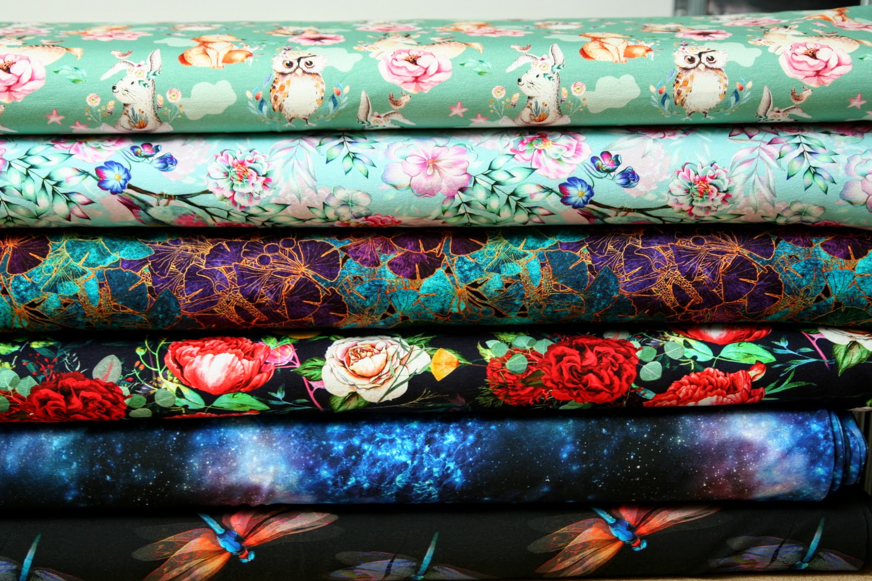 Teplákovina lištička s koloužky na jungle green